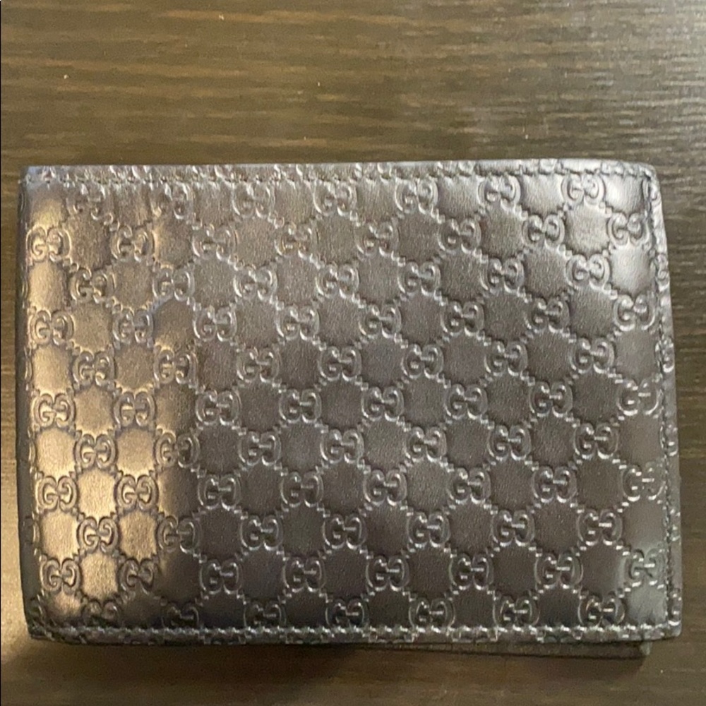 Authentic Gucci Men’s black wallet
